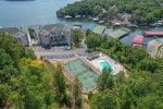 Drone view of Emerald Bay Tennis courts, 2nd Pool, Condos & Docks